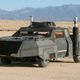 Illustration for article titled iWeaponizers/i: Remote-Controlled Armored Cars Fight Each Other To the Death
